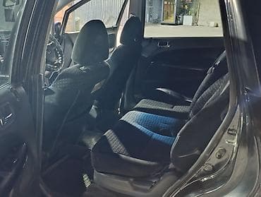 на вариант: Honda Stream: 2003 г., 2 л, Автомат, Бензин, Минивэн — 7