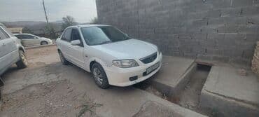 продаётся автомобиль: Mazda Familia: 2003 г., 1.3 л, Автомат, Бензин, Седан — 2