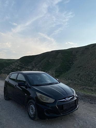капот на соната: Hyundai Solaris: 2011 г., Механика, Хэтчбэк — 9