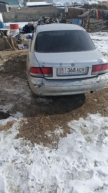 с авто: Mazda Cronos: 1993 г., 1.8 л, Механика, Бензин, Седан — 2