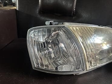 mazda 323 2003: Комплект передних фар Mazda 2000 г., Оригинал, Япония — 2