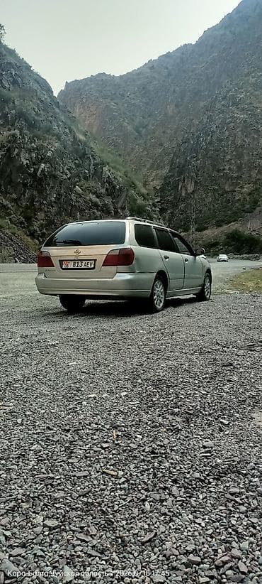 Унаа сатуу: Nissan Primera: 2001 г., 1.8 л, Кол менен иштөөчү, Бензин, Универсал — 6