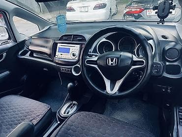мото мини: Honda Fit: 2009 г., 1.5 л, Автомат, Бензин, Хэтчбэк — 7