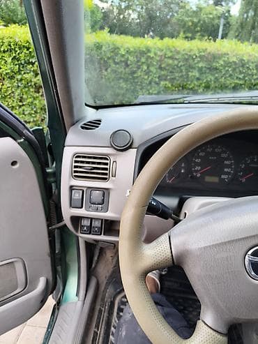 консоль 124: Mazda Demio: 2000 г., 1.3 л, Механика, Хэтчбэк — 4
