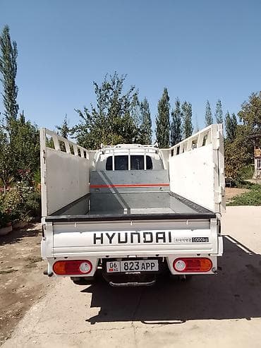 70 сом: Hyundai Porter II (бортовой малотоннажный грузовик) - Кабина — 5