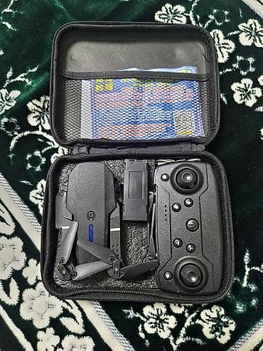 Видеонаблюдение: Складной квадрокоптер с пультом ДУ в комплекте Комплектация: - Дрон — 2