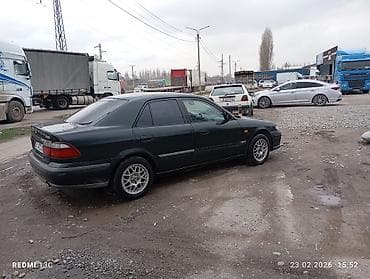 opel combo: Mazda 626: 1999 г., 1.8 л, Механика — 6
