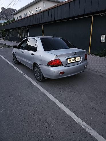 jac t9 hunter: Mitsubishi Lancer: 2005 г., Седан — 4