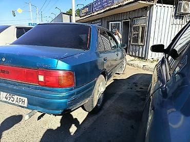 Транспорт: Mazda 323: 1991 г., 1.6 л, Механика, Бензин — 3