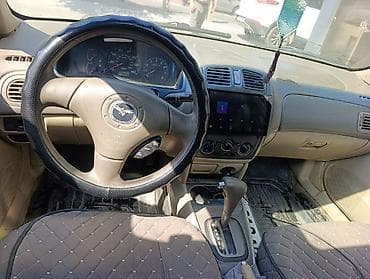 byd e7: Mazda 323: 2002 г., 1.6 л, Автомат, Бензин, Седан — 5