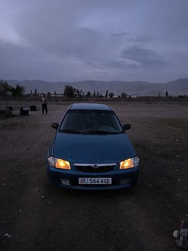 w124 124: Mazda 323: 1999 г., 1.5 л, Механика, Бензин, Универсал — 7