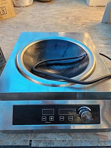 Электрическая вок-плита с комплектом посуды и аксессуаров Описание: -