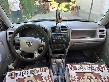 Унаа: Mazda Demio: 2002 г., 1.5 л, Автомат, Бензин, Хетчбек — 6