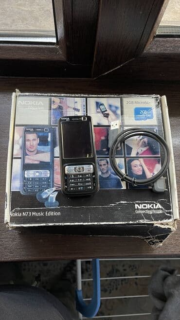 простые телефоны: Nokia N73, Б/у, < 2 ГБ, цвет - Черный, 1 SIM — 2
