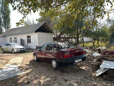 даевоо магнус: Daewoo Nexia: 2002 г., 1.5 л, Механика, Седан — 3