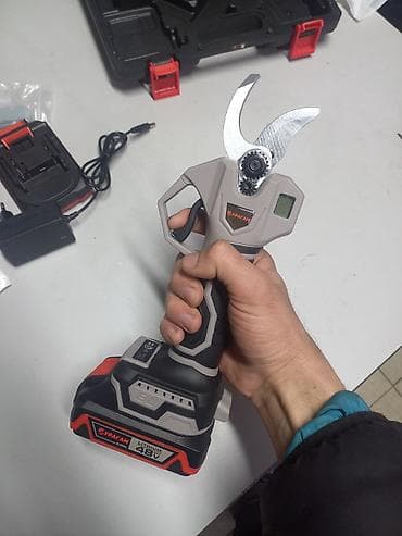 куста рез: Аккумуляторный электрический секатор Ураган YP5302 Назначение: - — 1