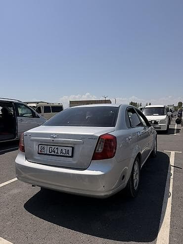 pm 2 5: Chevrolet Lacetti: 2005 г., 1.8 л, Механика, Газ, Седан — 5
