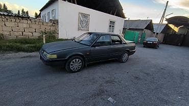 Унаа: Mazda 626: 1989 г., 2 л, Кол менен иштөөчү, Бензин, Седан — 2