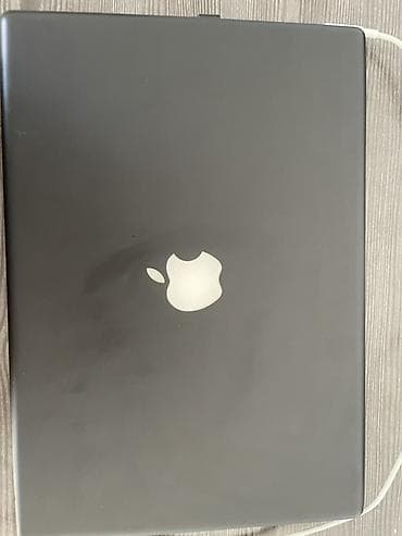 Техника и электроника: Apple MacBook (черный корпус) с зарядным устройством MagSafe — 1
