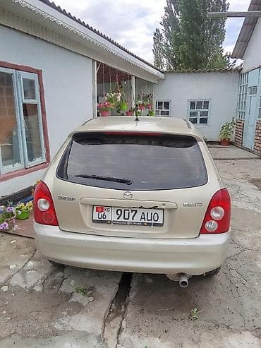 Mazda 323: 2003 г., 1.6 л, Механика, Бензин, Хэтчбэк — 3