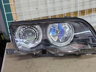 Автозапчасти: Передняя правая фара BMW 2000 г., Б/у — 6