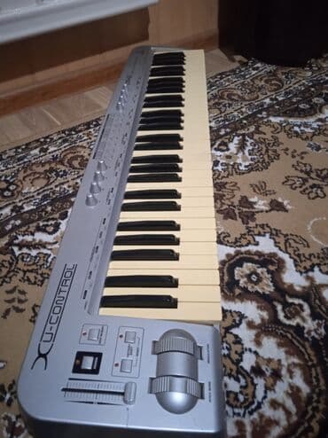 кызыл бирдик: MIDI-клавиатура Behringer UMX61 (U-Control) - 61 полноразмерная — 5