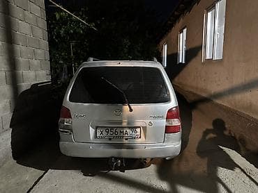 багажник на демио: Mazda Demio: 1999 г., 1.3 л, Автомат, Бензин, Универсал — 1