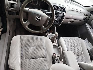 Транспорт: Mazda 626: 2000 г., 1.8 л, Механика, Бензин, Хэтчбэк — 5