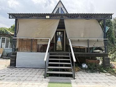 Каркасный дом A-Frame с большой крытой террасой at lalafo.kg Каркасный дом A-Frame с большой крытой террасой