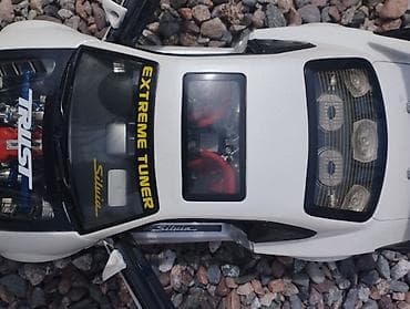 Спорт и отдых: Модель машины 1/12 NISSAN SILVIA 
NISSAN Motor c o.,L t D — 8