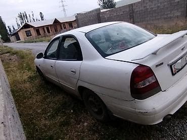 дайво нубиро: Daewoo Nubira: 1999 г., 1.5 л, Механика, Бензин, Седан — 6