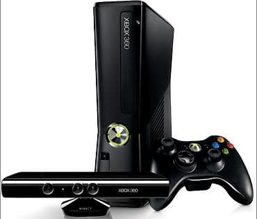 Продаю X Box 360 прошитая, с играми. 2 джойстика + kinect. Есть