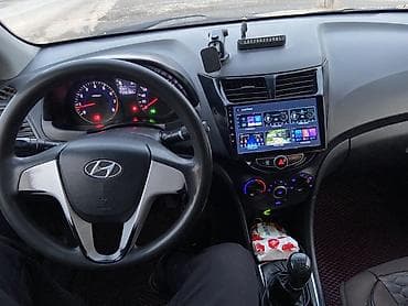 nissan tilda: Hyundai Solaris: 2012 г., 1.4 л, Механика, Газ, Седан — 7