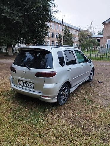 Mazda Demio: 2003 г., 1.3 л, Механика, Бензин, Хэтчбэк — 6