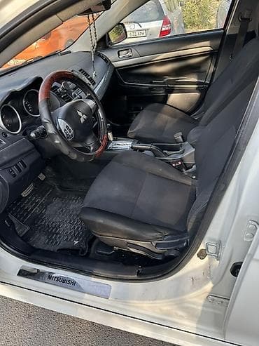митсубиши паджеро: Mitsubishi Lancer: 2010 г., 1.5 л, Автомат, Бензин, Седан — 6