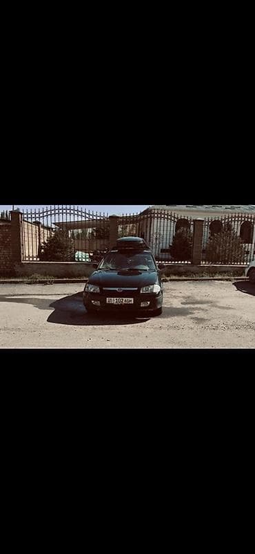 mazda primacy: Mazda 323: 1999 г., 1.6 л, Ручные, Бензин, Универсал — 4