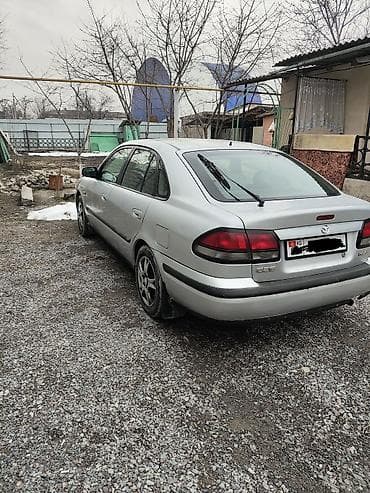 bmw x7: Mazda 626: 1997 г., 2 л, Механика, Бензин, Хэтчбэк — 2