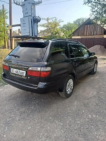 Транспорт: Mazda Capella: 1998 г., 2 л, Автомат, Универсал — 4