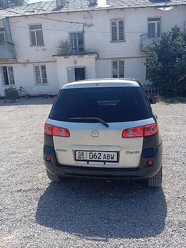 даихатсу сирион: Mazda Demio: 2005 г., 1.3 л, Автомат, Бензин, Хэтчбэк — 6