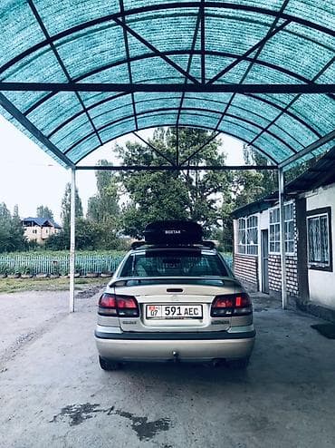 кабина сампо: Mazda Capella: 1998 г., 2 л, Автомат, Бензин, Седан — 5