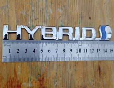 Эмблема для автомобиля Toyota/Lexys "HYBRID" с хромированной отделкой at lalafo.kg Эмблема для автомобиля Toyota/Lexys "HYBRID" с хромированной отделкой