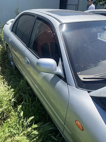 Продажа авто: Mazda 323: 1999 г., Механика, Бензин, Седан — 9