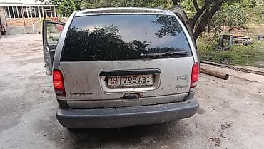 Chrysler Voyager: 1999 г., 2.4 л, Бензин, Вэн/Минивэн