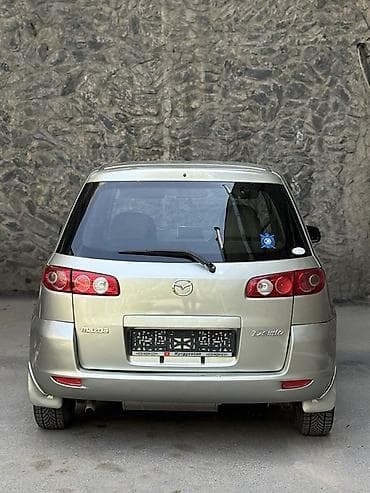 диски рекстон 1: Mazda Demio: 2004 г., 1.3 л, Автомат, Бензин, Хэтчбэк — 6
