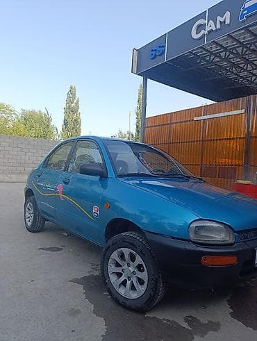 smart car: Mazda 121: 1991 г., 1.3 л, Механика, Бензин, Седан — 3