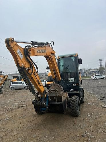 daf tandem: Экскаватор, Hyundai, Колесный — 3