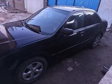 мазда крыло: Mazda Familia: 2001 г., Бензин, Седан — 1