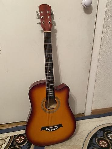 струна на гитару: Акустическая гитара с вырезом (cutaway), форма корпуса — дредноут — 2