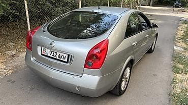 byd e7: Nissan Primera: 2003 г., Механика, Бензин, Хэтчбэк — 6