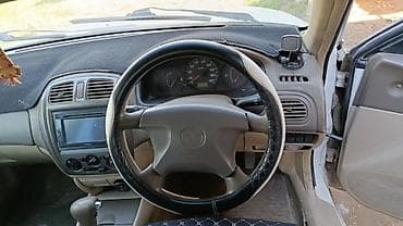 климат контроль марк 2: Mazda Familia: 2001 г., Автомат, Седан — 4